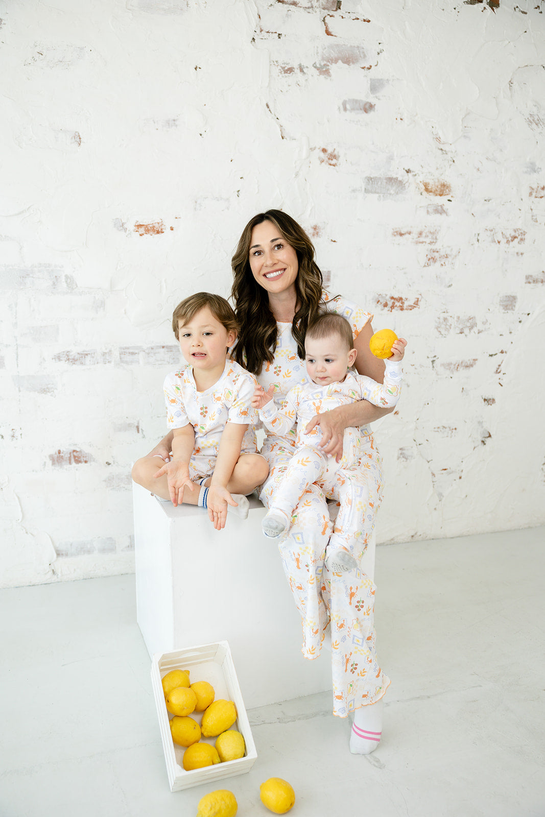 Mother with two children in matching Bianca & Bear Amalfi Pima cotton styles