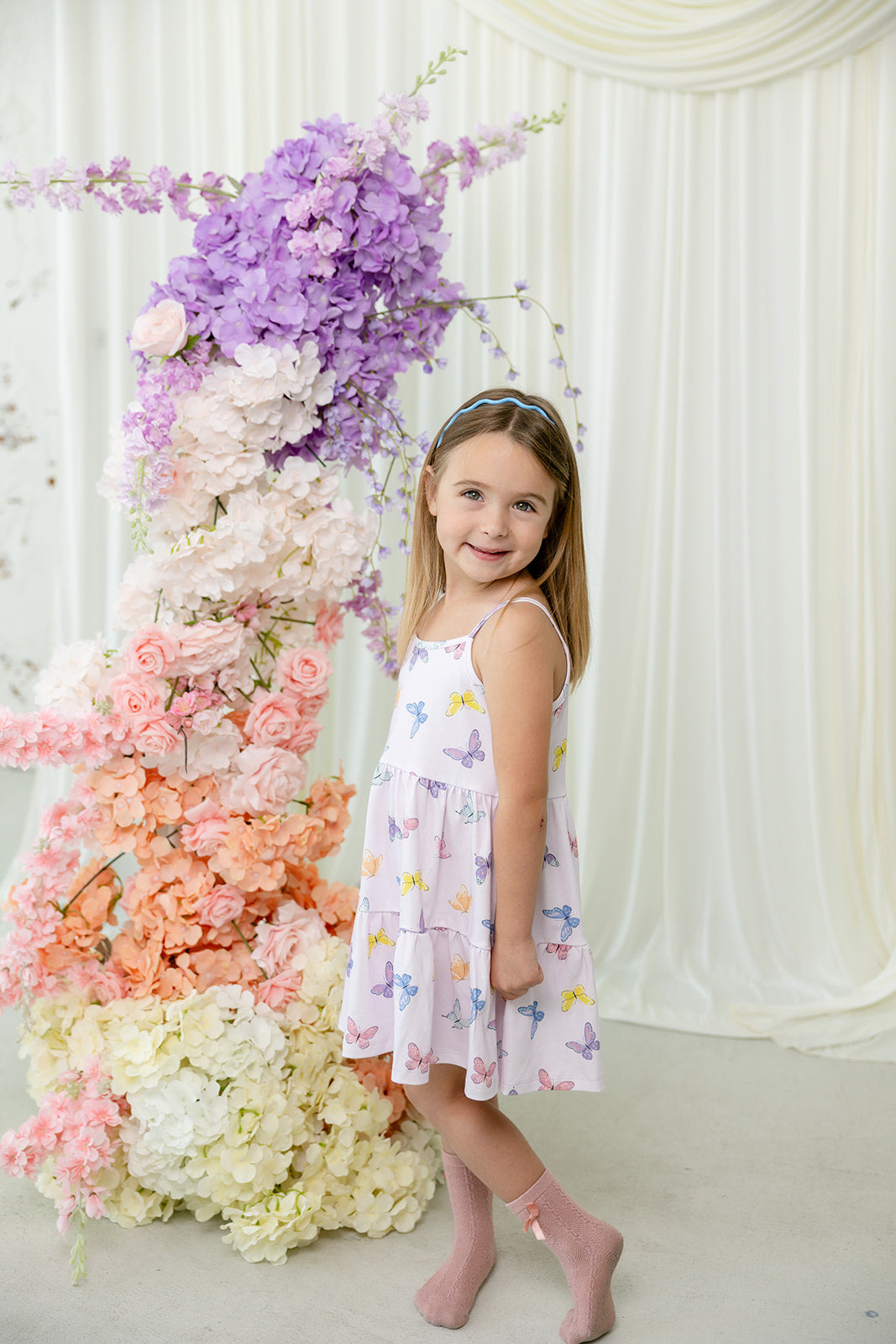 Child wearing Bianca & Bear Butterfly Pima cotton tank dress